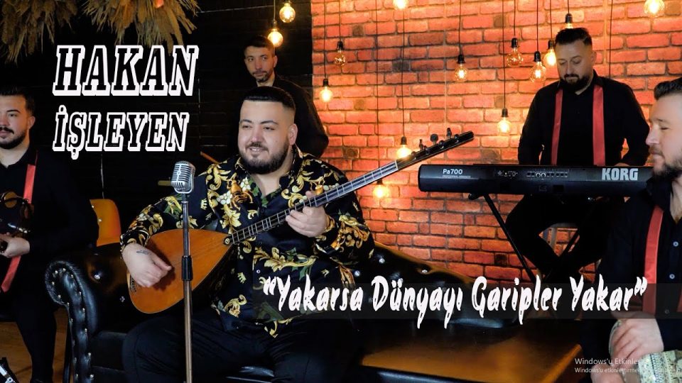 Hakan İşleyen - Yakarsa Dünyayı Garipler Yakar Şarkı Sözleri