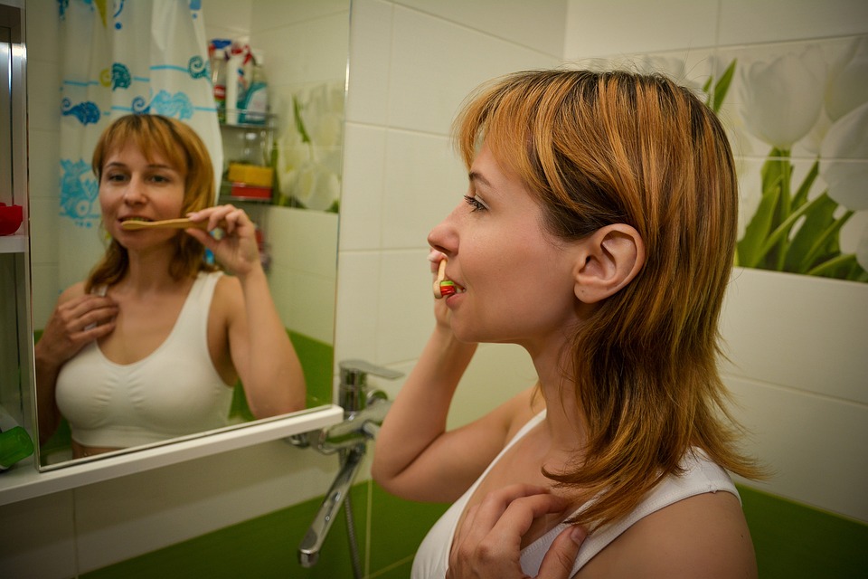 Can improper brushing cause damage to my teeth or gums?