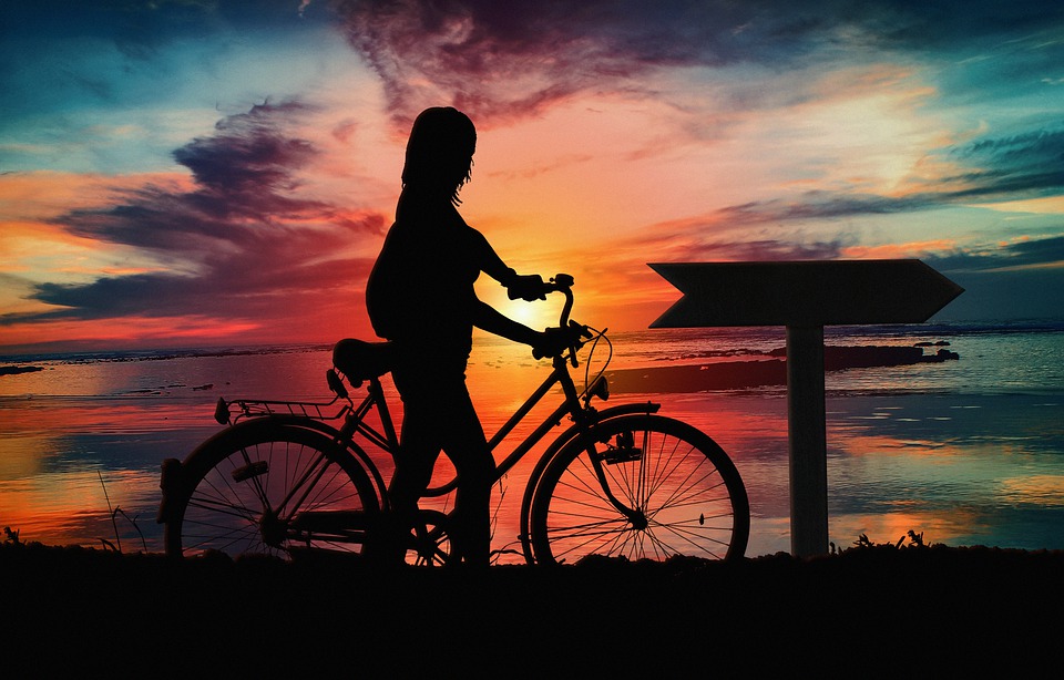 What is the best way to transport my bike for long-distance cycling trips?