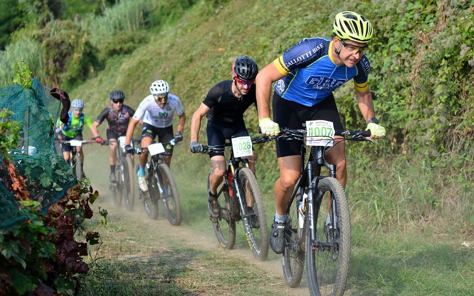 What type of cycling gear should I invest in to improve my performance and safety?