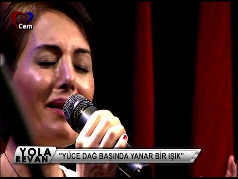 Özlem Eskimez – Yüce Dağ Başında Yanar Bir Işık Sözleri